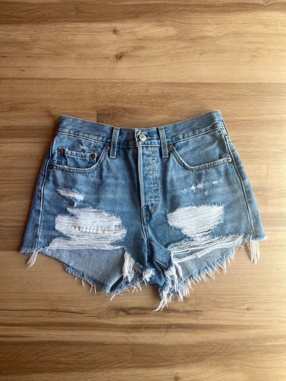 Levi's 501 Distressed Light Blue Cutoff Denim Shorts